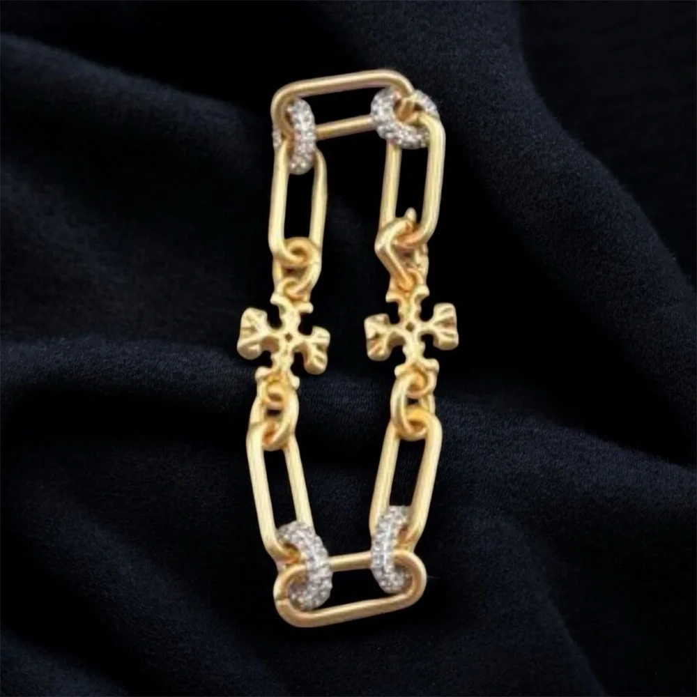 NWOT Auth. Tory Burch Roxanne Pave Bracelet in rolled Tory Antique Gold